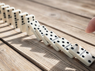 Stop the domino effect concept for business solution and interve