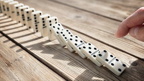 Stop the domino effect concept for business solution and interve