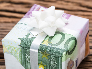 Gift Box Made From Euro Papernotes On Table