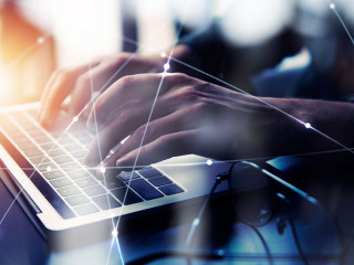 Business man works in office with laptop. Concept of internet network. double exposure