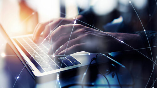 Business man works in office with laptop. Concept of internet network. double exposure