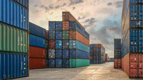 perspective view of containers at containers yard with forklift