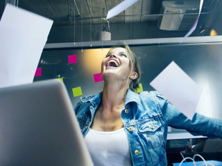 Business woman enjoy her work.