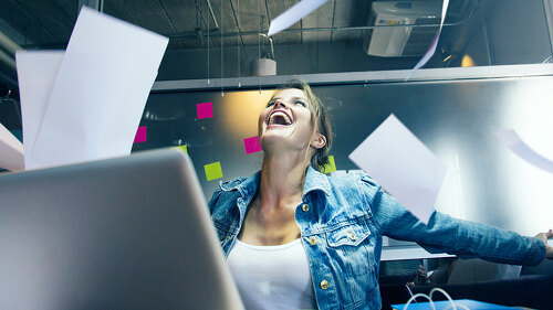 Business woman enjoy her work.