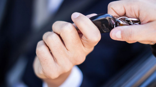 Man taking car key