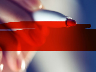 Red marker in female hand, highlighted area as copy space