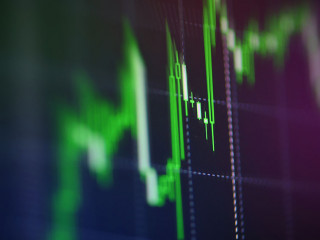 Stock market graph business / forex trading and candlestick anal
