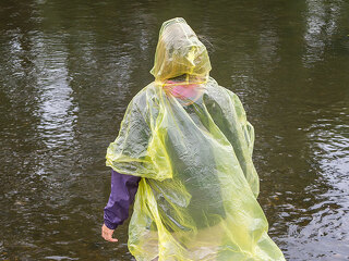 Woman with Rain Coat in the Rain
