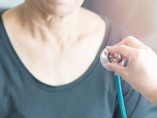 Doctor hand with stethoscope check up elderly woman people. Old