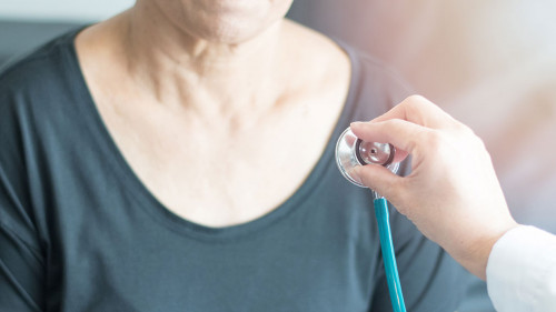 Doctor hand with stethoscope check up elderly woman people. Old