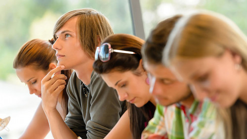 High-school student thinking at exam class teens
