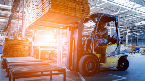 Forklift loader in storage warehouse ship yard. Distribution products. Delivery. Logistics. Transportation.