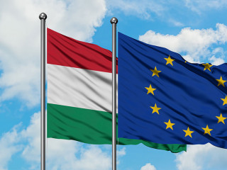 Hungary and European Union flag waving in the wind against white