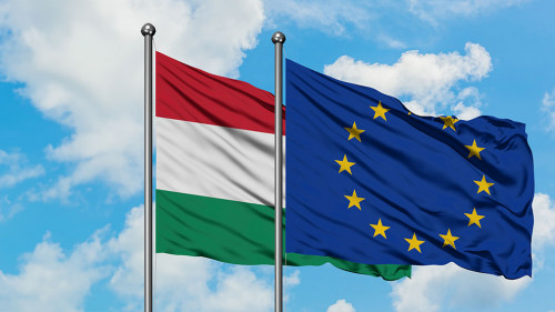 Hungary and European Union flag waving in the wind against white