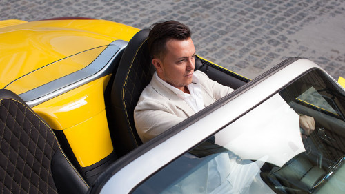 Man driving sport car