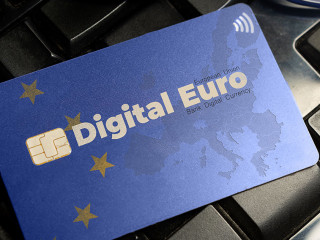 Digital euro currency concept: a credit card on a computer keybo