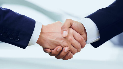 5721772 Business Partnership Giving Handshake.