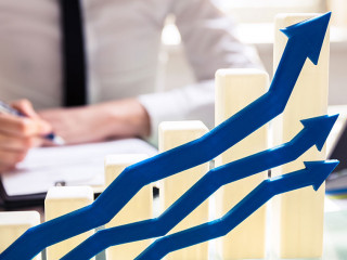 Blue Arrows In Front Of Graph Showing Upward Direction