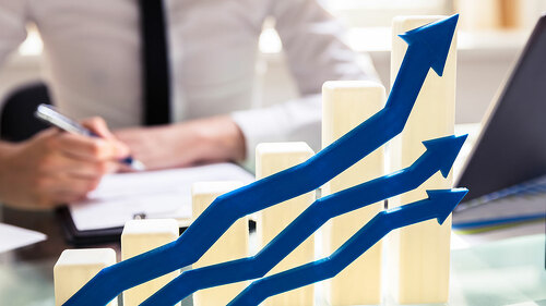 Blue Arrows In Front Of Graph Showing Upward Direction