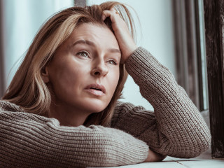 Woman thinking about suicide after personal problems