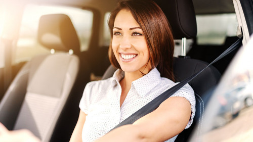 Portrait of beautiful caucasian woman with toothy smile and brow