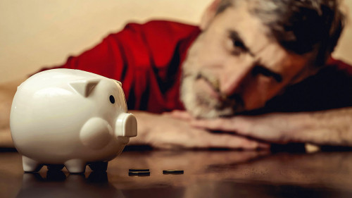 Mann-Sparschwein-107682570-DP-triocean2011