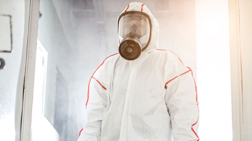 disinfector holding chemical sprayer and other equipment for sterilization