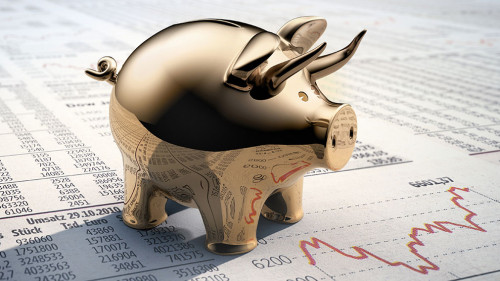 Goldenes Sparschwein auf Börsenkursen