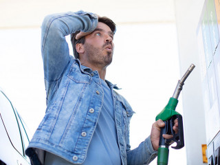man in shock with gas price