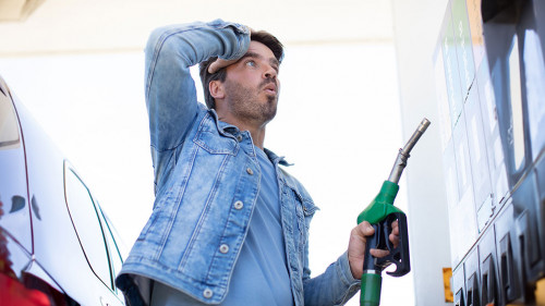 man in shock with gas price