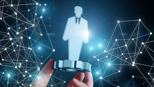 Worker on the gear in the hand of businessman.