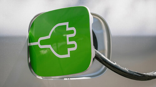charging the electric car in station. renewable energy in transp