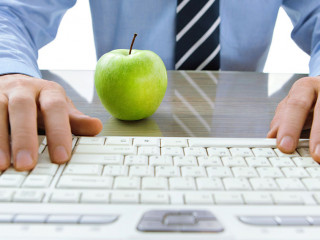 Typing male hands. Nature and technology concept