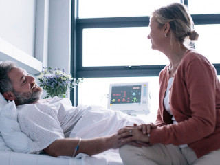 Wife visiting husband in hospital