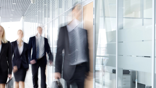 Businesspeople in corridor