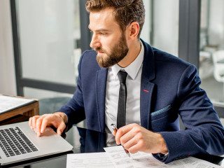 Tax manager working at the office