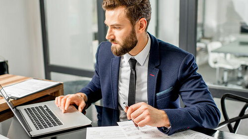 Tax manager working at the office