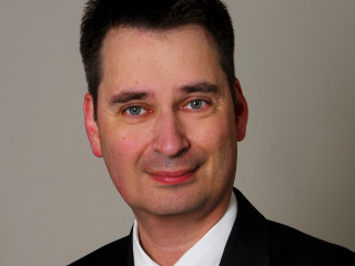 Michael Gerhard, Aktuar (DAV) bei der Longial GmbH