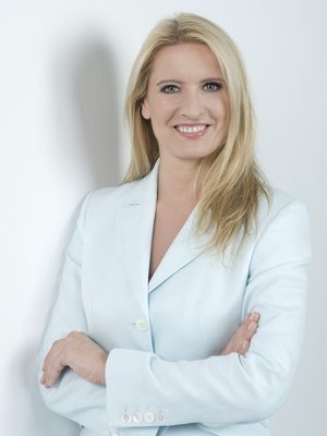 Wetterexpertin Claudia Kleinert hält einen Vortrag bei der LVM Versicherung.