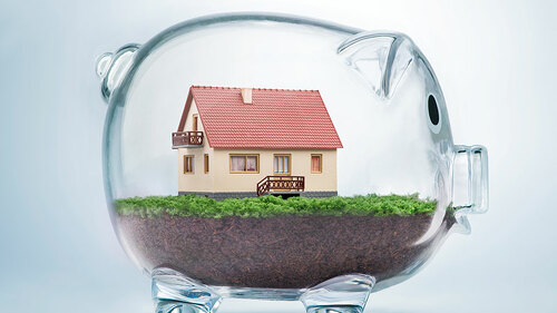 Sparschwein-mit-Haus-im-Bauch-101698587-FO-pogonici