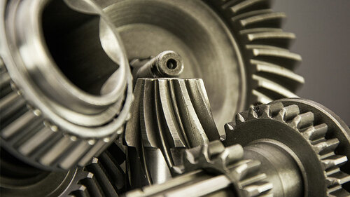 Zahnraeder-greifen-ineinander-72983580-FO-Viktor-Rolya