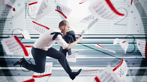 Anzugtraerger-Kalenderblaetter-Uhr-Stress-105564874-FO-alphaspirit