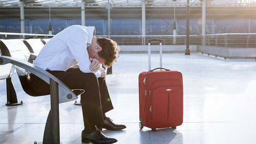 Anzugtraeger-muede-Flughafen-84612769-FO-NicoElNino