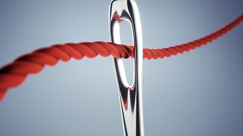 Roter-Faden-durch-Nadeloehr-90203020-FO-psdesign1