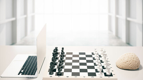 schachbrett-versus-laptop-und-gehirn-108904048-FO-peshkov