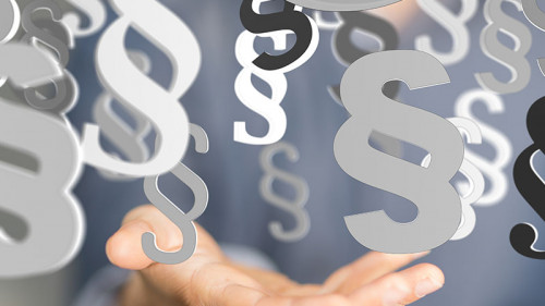 hand-mit-paragraphen-113932848-fo-vege