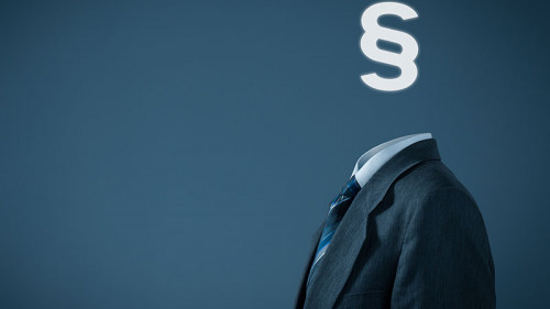 anzugtraeger-mit-paragraphen-als-kopf-72767423-fo-jakub-jirsak