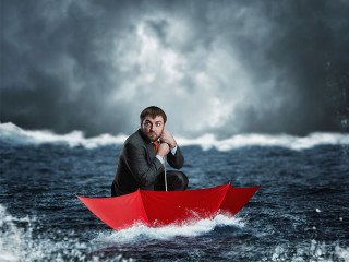 Anzugraeger-in-Regenschirm-auf-See-82168034-FO-Nomad-Soul