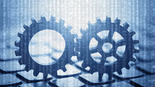 Zahnraeder-auf-Tastatur-Code-169406907-FO-Jakub-Krechowicz