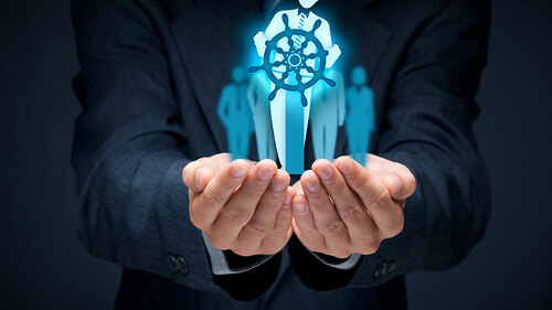 Anzugtraeger-Koepfe-Steuerrad-119679943-FO-Jakub-Jirsák